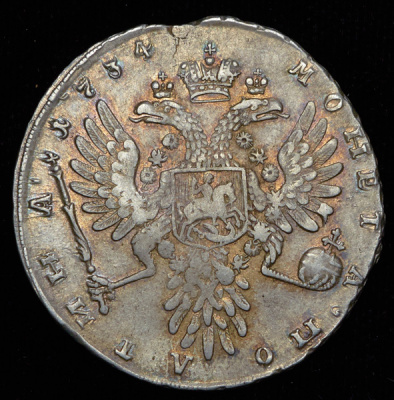 Полтина 1734 г. Анна Иоанновна. Тип года. С кулоном на груди. Крест державы простой (Полтина 1734)
