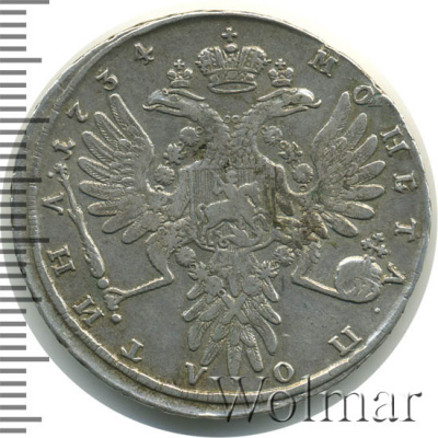 Полтина 1734 г. Анна Иоанновна. Лирический портрет. Корона разделяет круговую надпись (Полтина 1734г. Ag. RRR, Ильин - 10 рублей.)