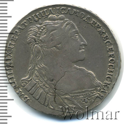 Полтина 1734 г. Анна Иоанновна. Тип года. С кулоном на груди. Крест державы узорчатый (Полтина 1734г. Ag. Петров - 2,25 рубля.)